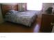 Bedroom with a bed and a wooden headboard and a wooden dresser at 1707 Santa Paula Dr, Las Vegas, NV 89104