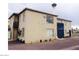 Exterior view of a two-story building, showcasing its architectural style and surrounding landscape at 1707 Santa Paula Dr, Las Vegas, NV 89104