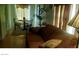 Living room with a couch, dining table, and a view of the outside at 1707 Santa Paula Dr, Las Vegas, NV 89104