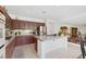Well-lit kitchen with granite countertops, stainless steel appliances, and ample storage at 3179 Surf Spray St, Las Vegas, NV 89117
