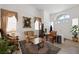 Elegant foyer featuring tile flooring, high ceilings, and double front doors with transom windows at 3179 Surf Spray St, Las Vegas, NV 89117
