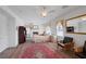 Spacious main bedroom featuring a ceiling fan, fireplace, and decorative rug at 3179 Surf Spray St, Las Vegas, NV 89117
