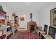 Office featuring vintage furniture, hardwood floor, and decorative rug at 3179 Surf Spray St, Las Vegas, NV 89117