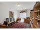 Cozy office space with hardwood floor, vintage furniture, and decorative rug at 3179 Surf Spray St, Las Vegas, NV 89117