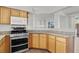 Kitchen with stainless steel appliances and granite countertops at 8010 Arcadian Ln, Las Vegas, NV 89147