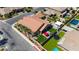 Aerial view of house with backyard, pool, and trampoline at 3870 Valles Caldera Ct, Las Vegas, NV 89118