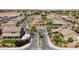 Aerial view of a community with houses and palm trees at 3870 Valles Caldera Ct, Las Vegas, NV 89118