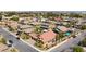 Aerial view of house, pool, and neighborhood at 3870 Valles Caldera Ct, Las Vegas, NV 89118