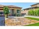 Front yard with a unique water fountain feature at 3870 Valles Caldera Ct, Las Vegas, NV 89118