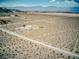 Expansive desert property featuring a home with separate structure, mountain views, and ample land at , Pahrump, NV 89060