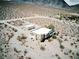 Desert home with separate structure featuring neutral tones and beautiful desert surroundings at , Pahrump, NV 89060