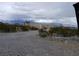 Exterior shot of gravel driveway with desert landscape at , Pahrump, NV 89060