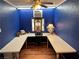 Home office space with built-in wrap around desk and plenty of natural light at , Pahrump, NV 89060