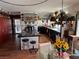Open kitchen with black countertops, a center island, and updated appliances at , Pahrump, NV 89060