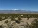 Picturesque view of the expansive desert landscape with mountains in the background at , Pahrump, NV 89060