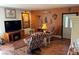 Cozy living room with unique decor, wood floors, and comfortable seating creates a welcoming atmosphere at , Pahrump, NV 89060