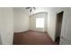 Bedroom with brown carpet, ceiling fan, and window blinds at 6072 Corbin Ave, Las Vegas, NV 89122