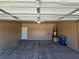 Attached two-car garage with light and ceiling storage at 6072 Corbin Ave, Las Vegas, NV 89122