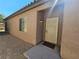 House entrance with decorative security door and small welcome mat at 6072 Corbin Ave, Las Vegas, NV 89122