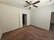 Spacious main bedroom with carpet and ceiling fan at 6072 Corbin Ave, Las Vegas, NV 89122