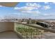 Enjoy breathtaking views from this condo's balcony, overlooking a putting green and city skyline at 135 E Harmon Ave # 1020, Las Vegas, NV 89109