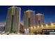 Exterior view of the tall building at night at 135 E Harmon Ave # 1020, Las Vegas, NV 89109