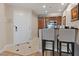 Convenient kitchen features breakfast bar and essential appliances, seamlessly blending functionality and style at 135 E Harmon Ave # 1020, Las Vegas, NV 89109