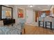 Contemporary living area features dining space with kitchen in the background at 135 E Harmon Ave # 1020, Las Vegas, NV 89109