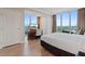 Main bedroom with a scenic view, built-in desk, and ample natural light at 135 E Harmon Ave # 1020, Las Vegas, NV 89109