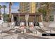 Enjoy the poolside lounge area with comfortable seating and towel service in a private cabana at 135 E Harmon Ave # 1020, Las Vegas, NV 89109