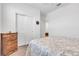 Clean bedroom with white walls, minimal decor and plush patterned bedding at 3558 E Malheur Ave, Pahrump, NV 89061