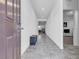 Bright entryway with tile floors, white walls, and an open floor plan leading into the home's living spaces at 3558 E Malheur Ave, Pahrump, NV 89061