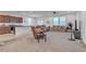 Open-concept space features a seamless flow between the kitchen and the living room at 3558 E Malheur Ave, Pahrump, NV 89061