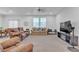 Inviting living room features neutral-toned walls, plush seating, and ample natural light at 3558 E Malheur Ave, Pahrump, NV 89061