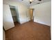 Bedroom features tile flooring, a standard closet, and access to other rooms at 213 N Lamb Blvd # D, Las Vegas, NV 89110