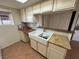 A functional kitchen with a white farmhouse sink and ample counter space, perfect for culinary activities at 213 N Lamb Blvd # D, Las Vegas, NV 89110