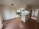 Well-lit kitchen with a breakfast bar and modern appliances, seamlessly blending cooking and dining areas at 213 N Lamb Blvd # D, Las Vegas, NV 89110