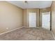 Neutral bedroom with carpet, ceiling fan and closet at 5655 E Sahara Ave # 1052, Las Vegas, NV 89142