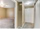 View of hallway with carpet and doors to rooms at 5655 E Sahara Ave # 1052, Las Vegas, NV 89142