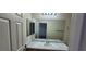 Clean bathroom with vanity, sink, and bathtub at 9229 Millikan Ave, Las Vegas, NV 89148