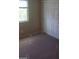 Well-lit bedroom with sliding closet doors at 9229 Millikan Ave, Las Vegas, NV 89148
