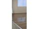 Bedroom with wood-look flooring and window at 9229 Millikan Ave, Las Vegas, NV 89148