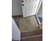 Front entry with tiled floor and carpet at 9229 Millikan Ave, Las Vegas, NV 89148