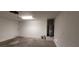 Empty garage with water heater and extra space at 9229 Millikan Ave, Las Vegas, NV 89148