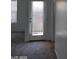 Hallway with door leading outside at 9229 Millikan Ave, Las Vegas, NV 89148