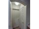 Bright hallway with access to bedrooms and closets at 9229 Millikan Ave, Las Vegas, NV 89148