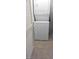 Stackable washer and dryer in a small laundry room at 9229 Millikan Ave, Las Vegas, NV 89148