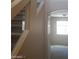 Stairwell with glass and wooden railing at 9229 Millikan Ave, Las Vegas, NV 89148