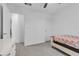 A bright bedroom with neutral color scheme and carpet flooring at 10664 Sariah Skye Ave, Las Vegas, NV 89166