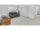 Bright carpeted bonus room, offering plenty of space for relaxation and recreation at 10664 Sariah Skye Ave, Las Vegas, NV 89166